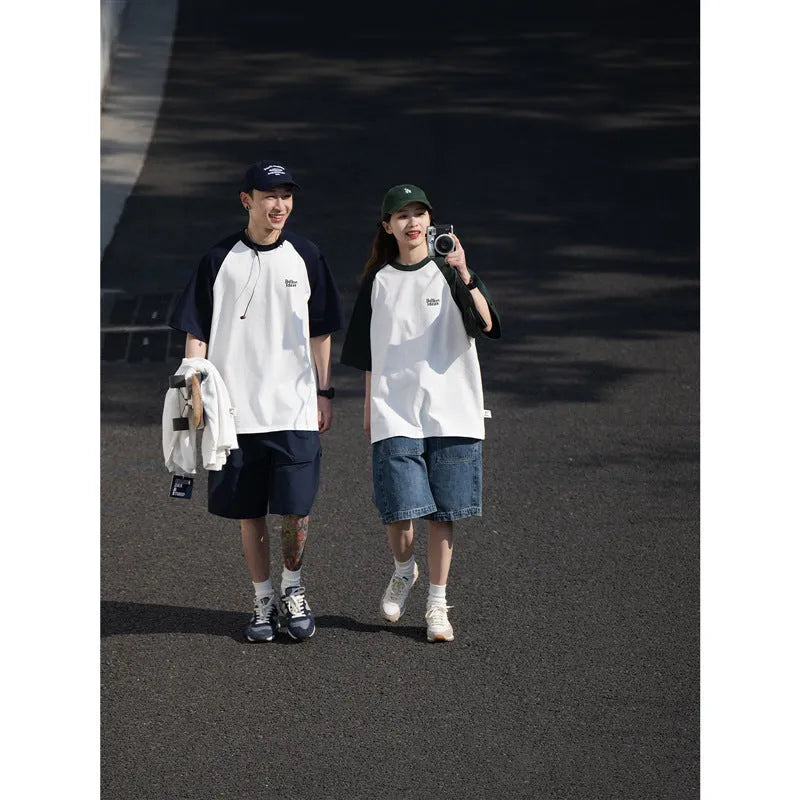 Japanese-style raglan sleeve t-shirt in blue, green, and grey colours with loose fit design