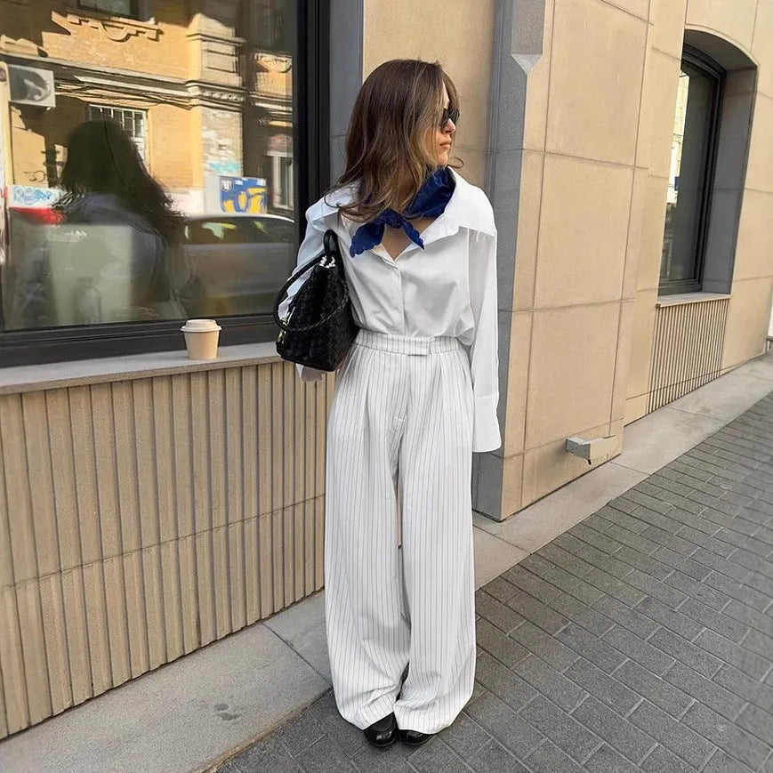 White striped wide-leg commuting trousers with zip closure on Asian-sized mannequin