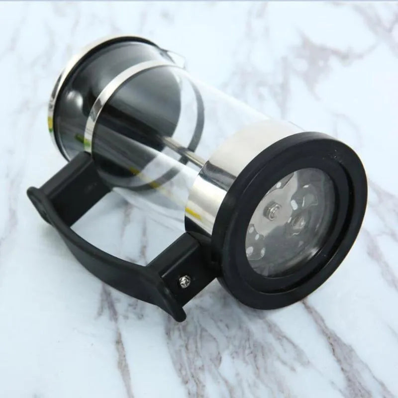 Compact glass stovetop coffee maker with stainless steel components, shown with dimensions 10cm wide and 17cm high.