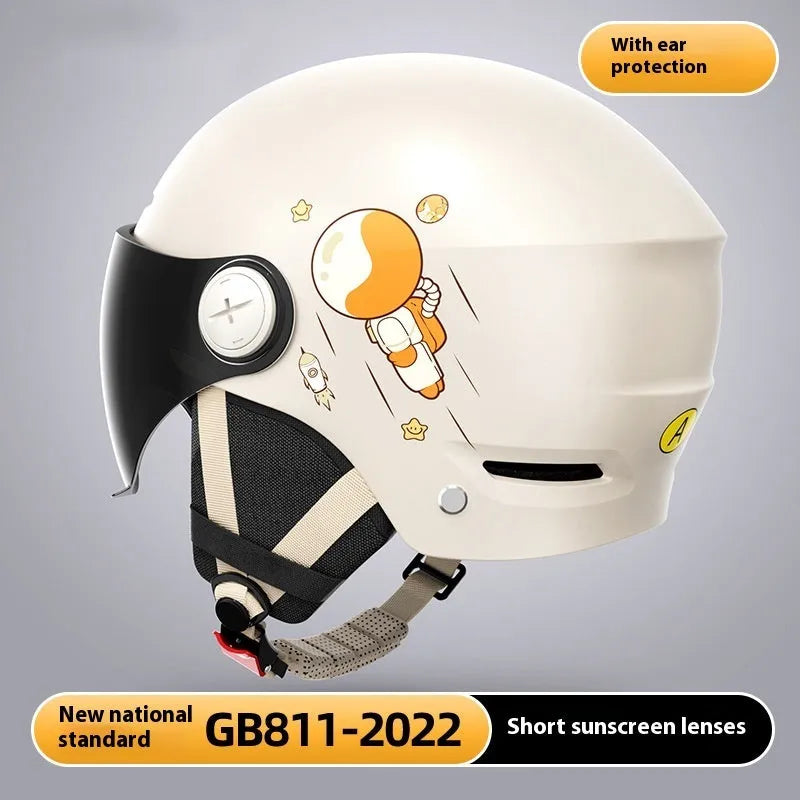 Khaki coloured electric motorcycle half helmet with interchangeable lens system shown from side view