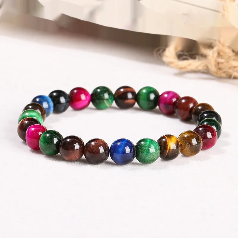 Colourful tiger-eye gemstone bead bracelet in round beads on a string.