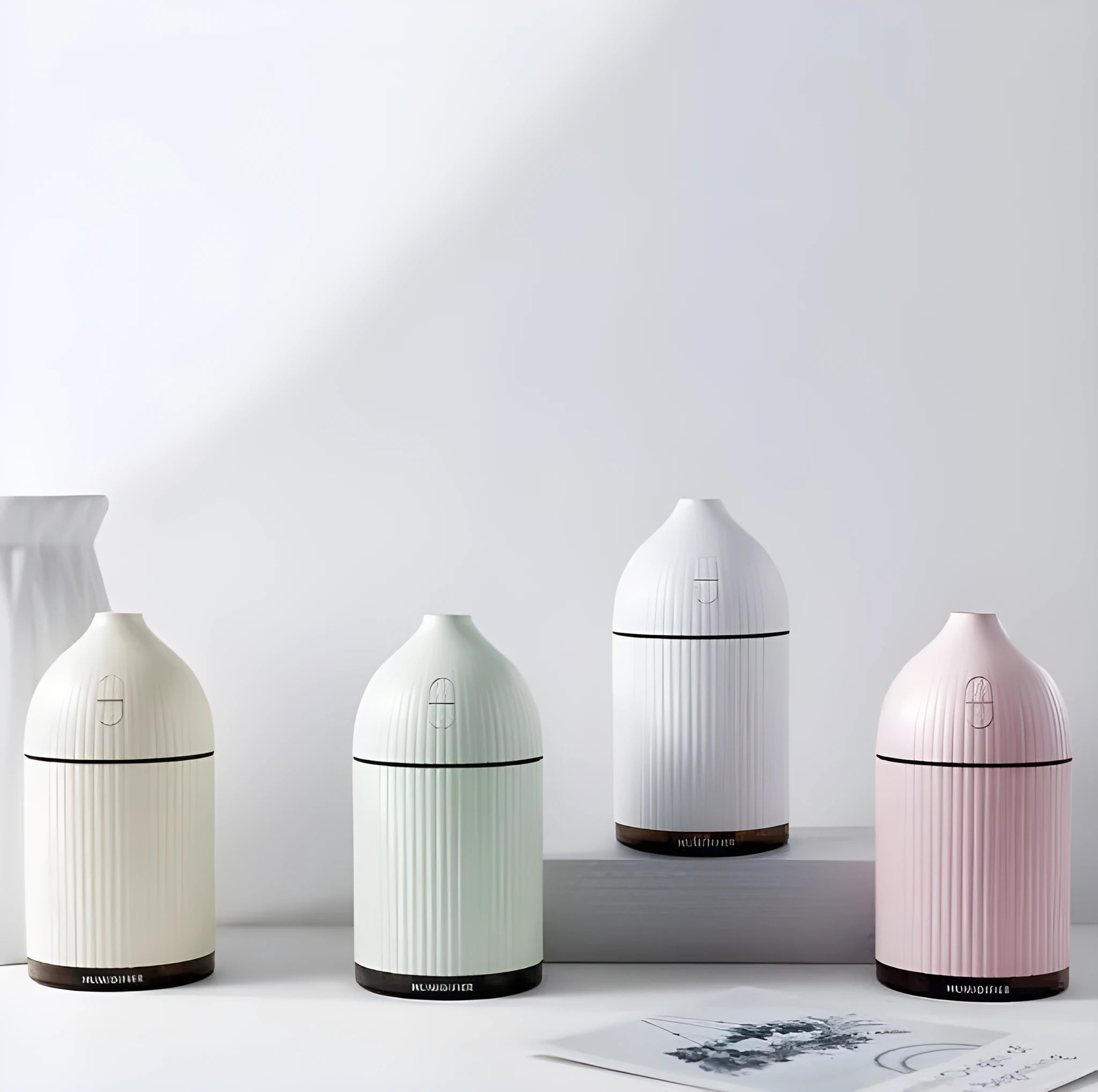 White 300ml ultrasonic aromatherapy diffuser with LED lights and USB cable