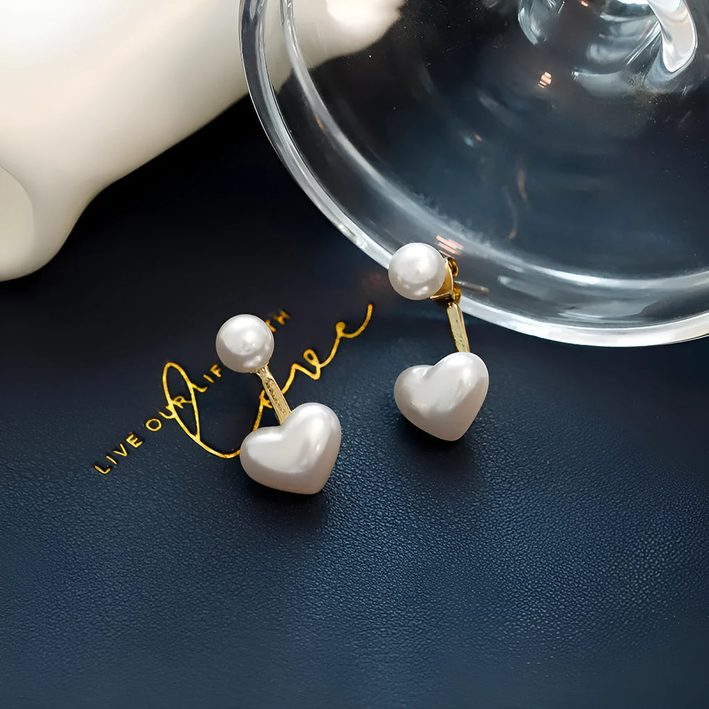 Korean style heart-shaped pearl stud earrings for women with artificial gem inlays on electroplated alloy.