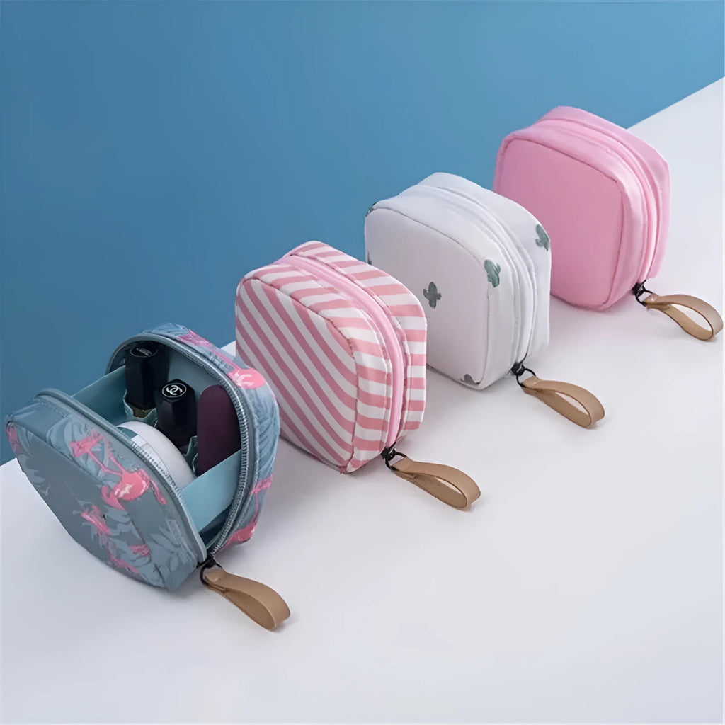 A blue cube-shaped cloth makeup storage bag for organising cosmetics and brushes.