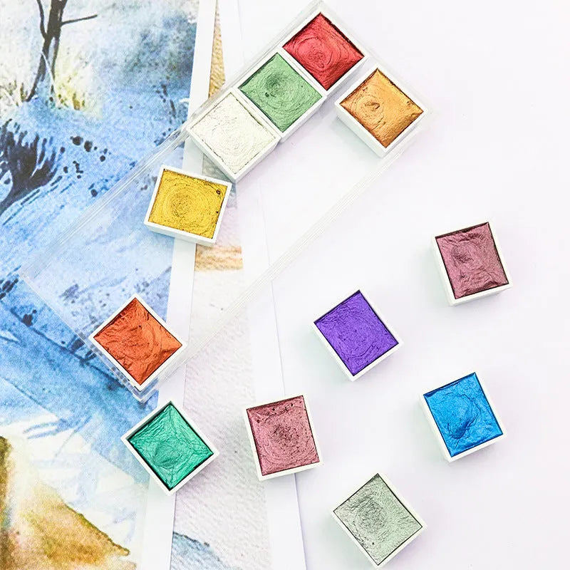 Box of solid pearlescent watercolour pigment blocks in gem, starlight, and pearl colours