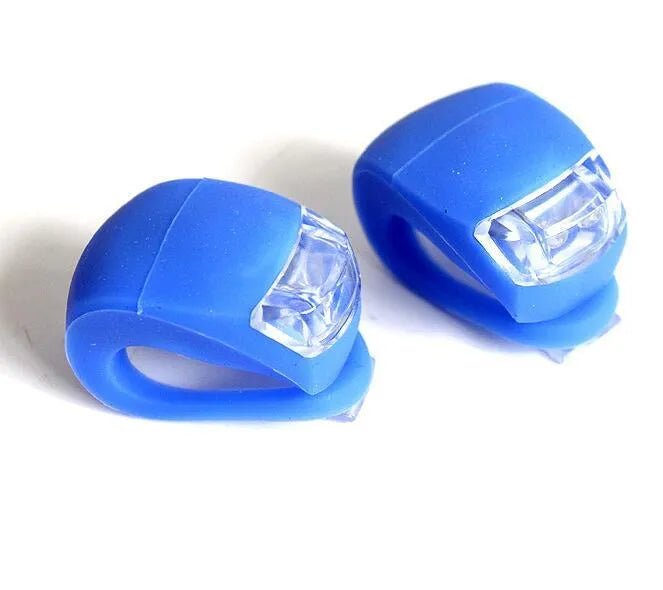 LED bike safety light with flexible silicone body, clip-on fitting and one-touch switch for cycling and nighttime use
