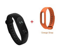 Xiaomi Mi Band 2 black fitness tracker on wrist showing OLED touchscreen display