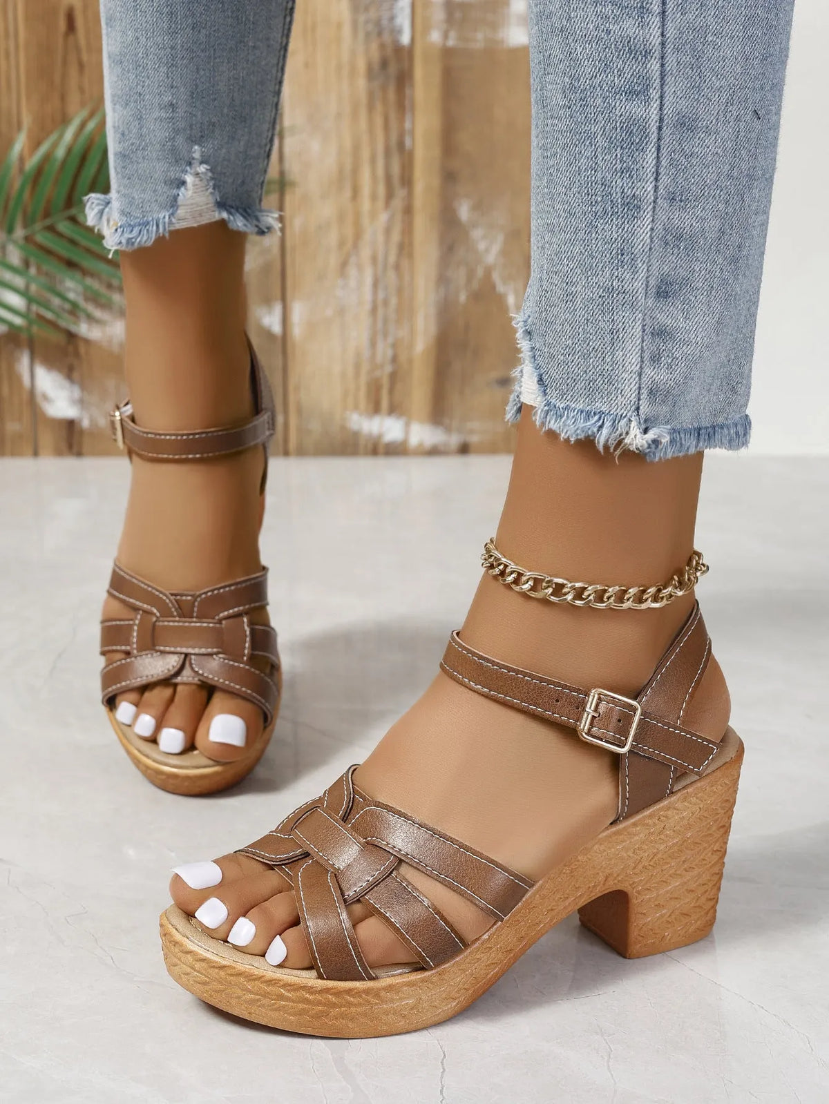 Plus size women's black peep toe sandal with chunky heel and buckle ankle strap.