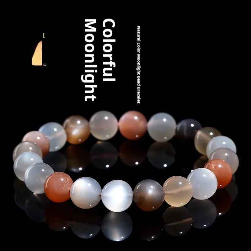 Natural colourful moonstone unisex bracelet with 8mm beads on a wrist.