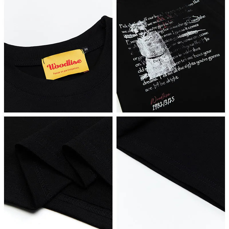 Men's black loose fit cotton t-shirt with white printed letter design and raglan short sleeves