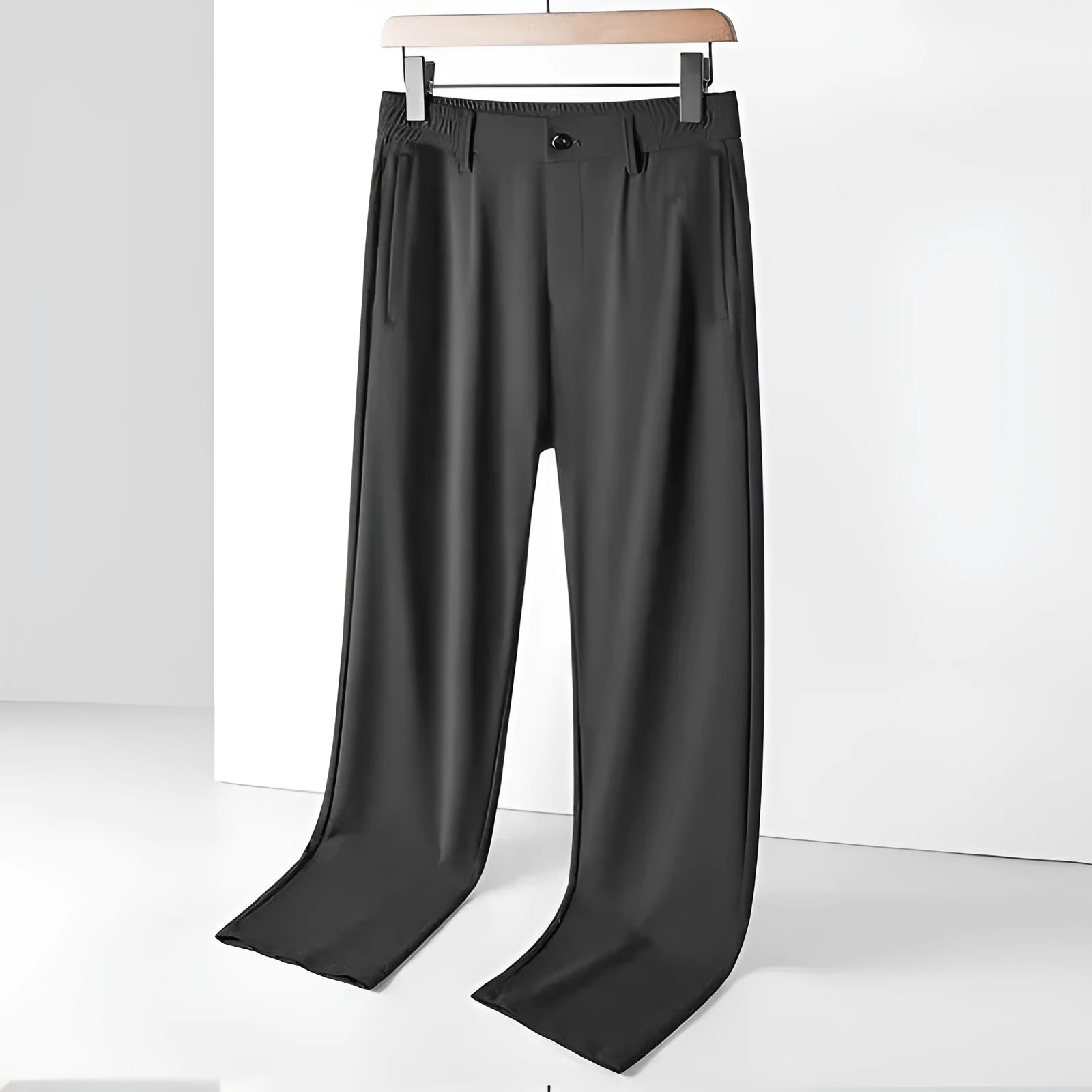 Man wearing black ice silk loose straight-leg trousers with a high elasticity open waist.