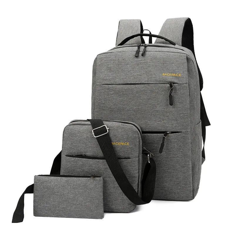 Men's USB charging computer bag three-piece set in navy blue with multiple compartments and anti-theft features