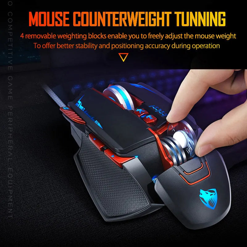 Thunder Wolf V9 black and grey wired gaming mouse on a desktop mat.