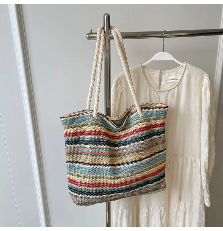 Blue straw woven shoulder bag with nylon construction and polyester lining