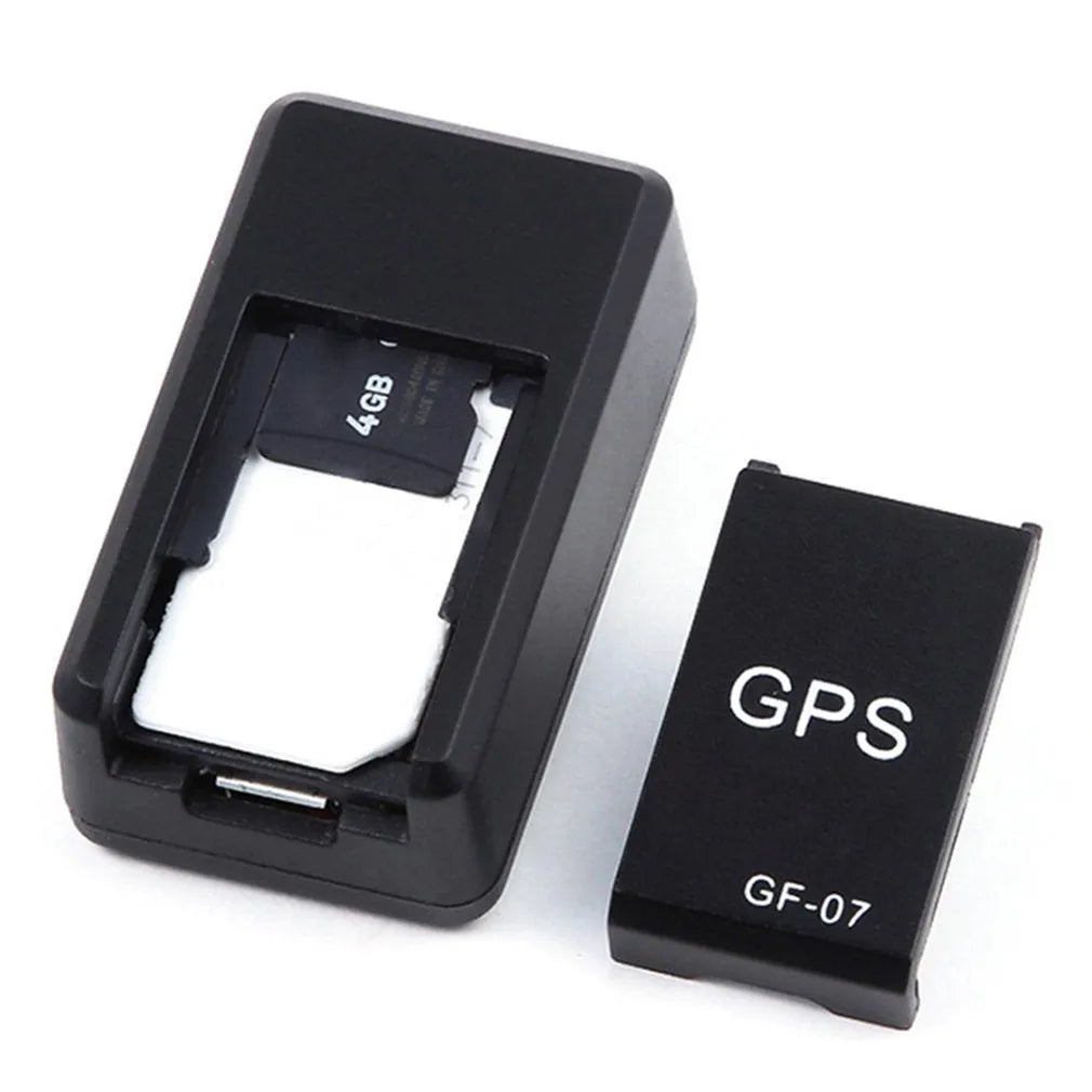 Black magnetic GPS tracker device measuring 35x20x14mm with USB charging cable for vehicle and personal tracking