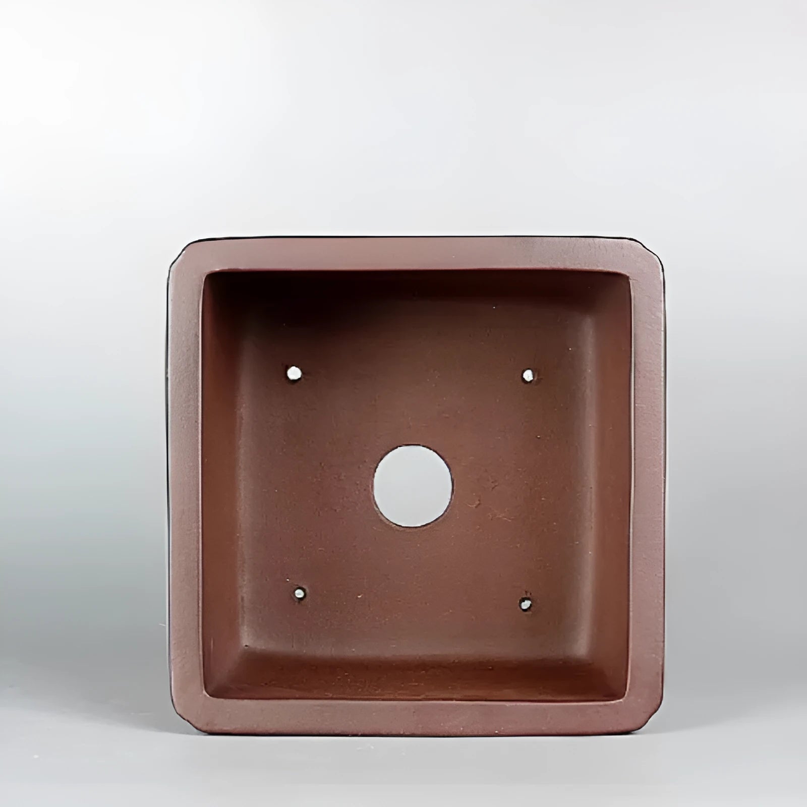 Brown handmade purple clay flower pot with classical antique design