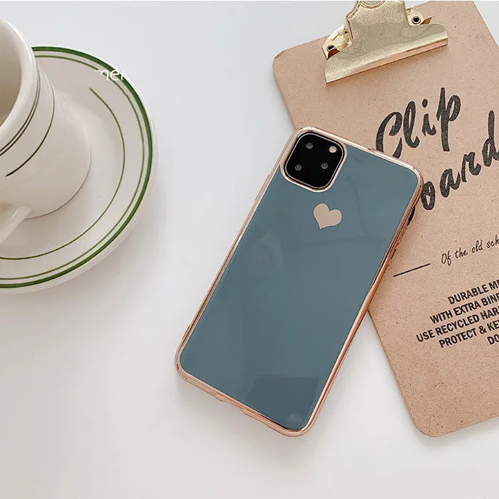 Solid blue TPU back cover case on an iPhone showing simple design and colour.