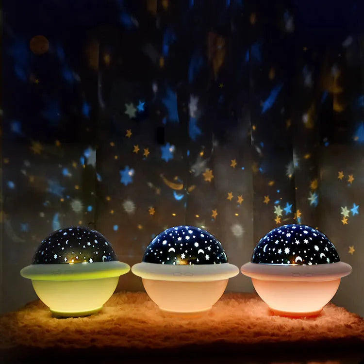 UFO-shaped LED projection night light in green, pink or white colours projecting starry sky patterns