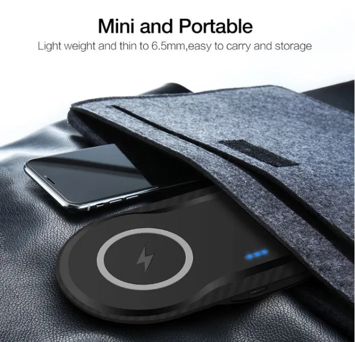 Black and white dual wireless charging pad with two smartphone charging surfaces and anti-slip silicone base