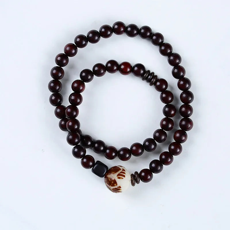 Natural rosewood double-ring bracelet with knitting construction and flower pattern elements