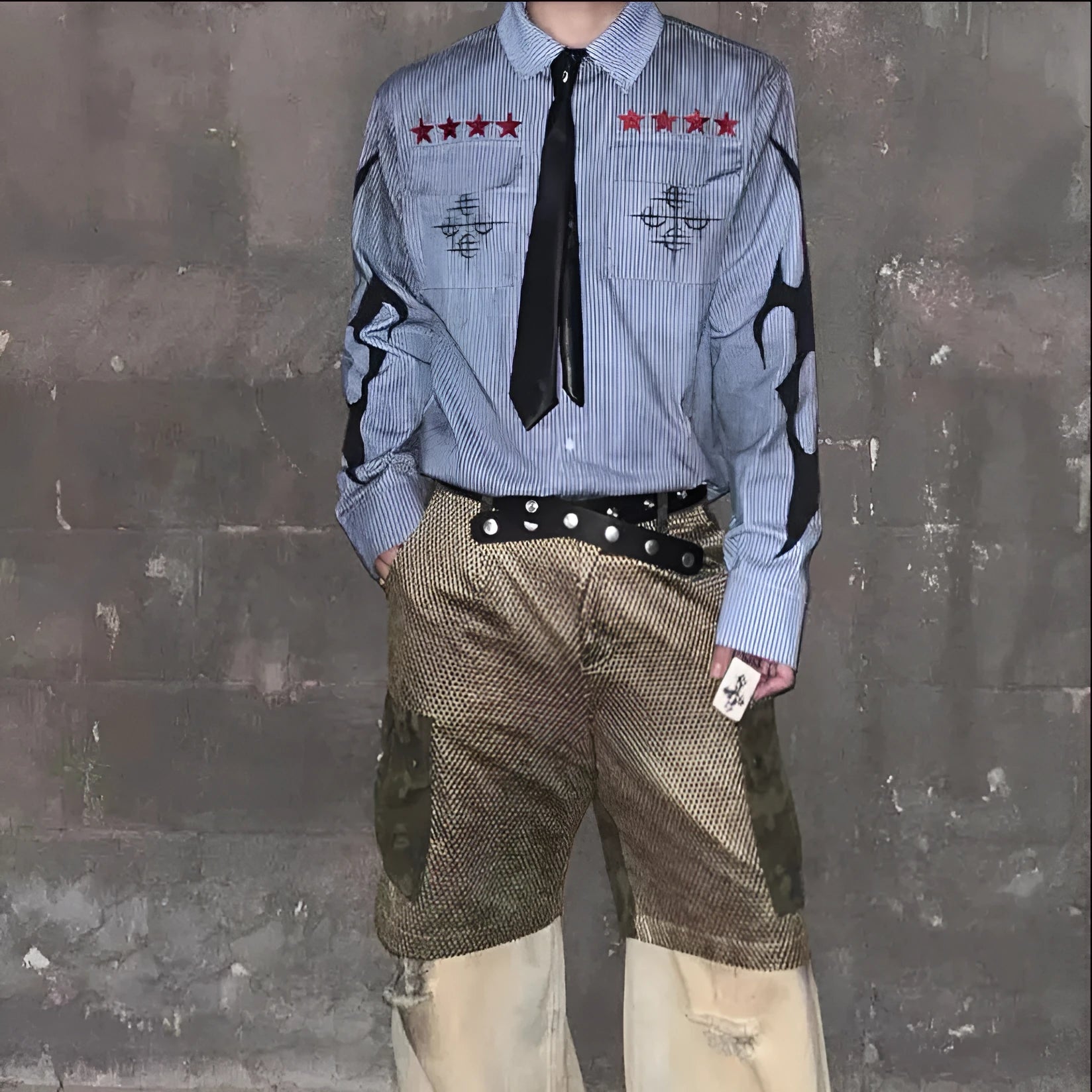 Men's washed blue striped denim shirt with lapel collar and long sleeves on hanger