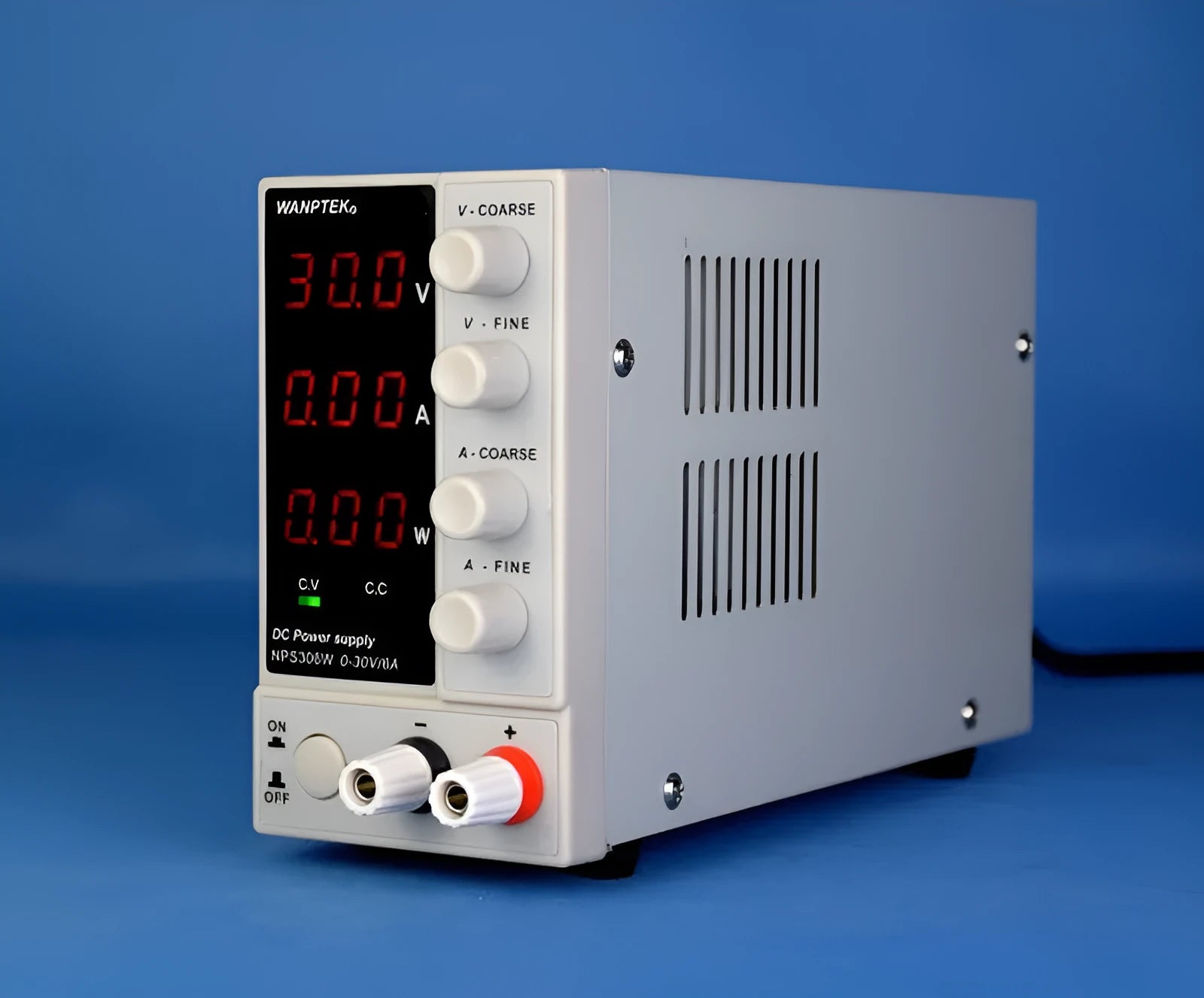 White adjustable DC power supply with voltage and current controls for electronics repair