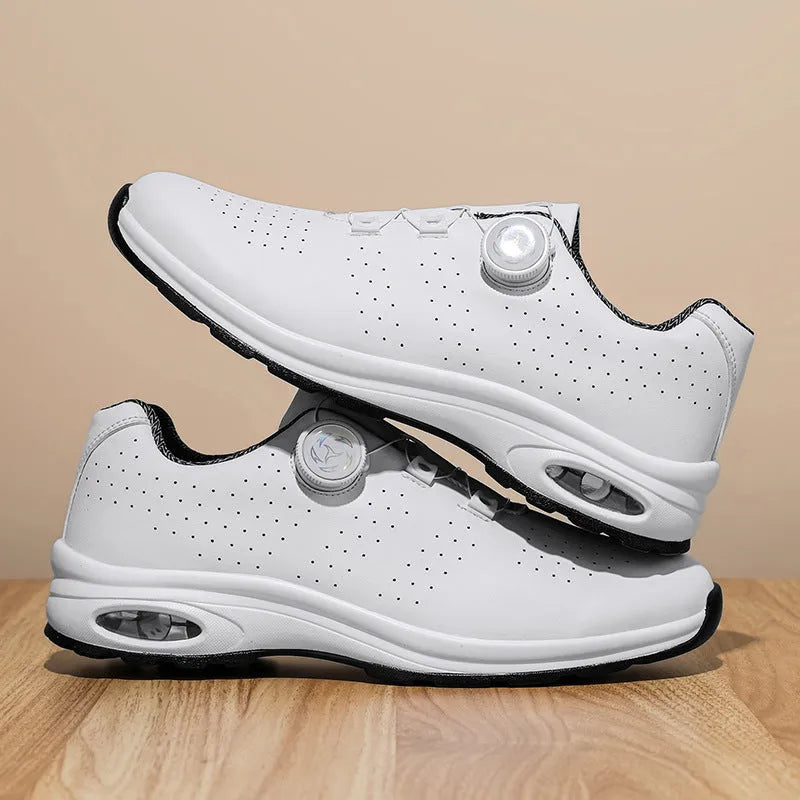 Men's black and white low-top casual tennis shoes with mesh uppers and composite soles
