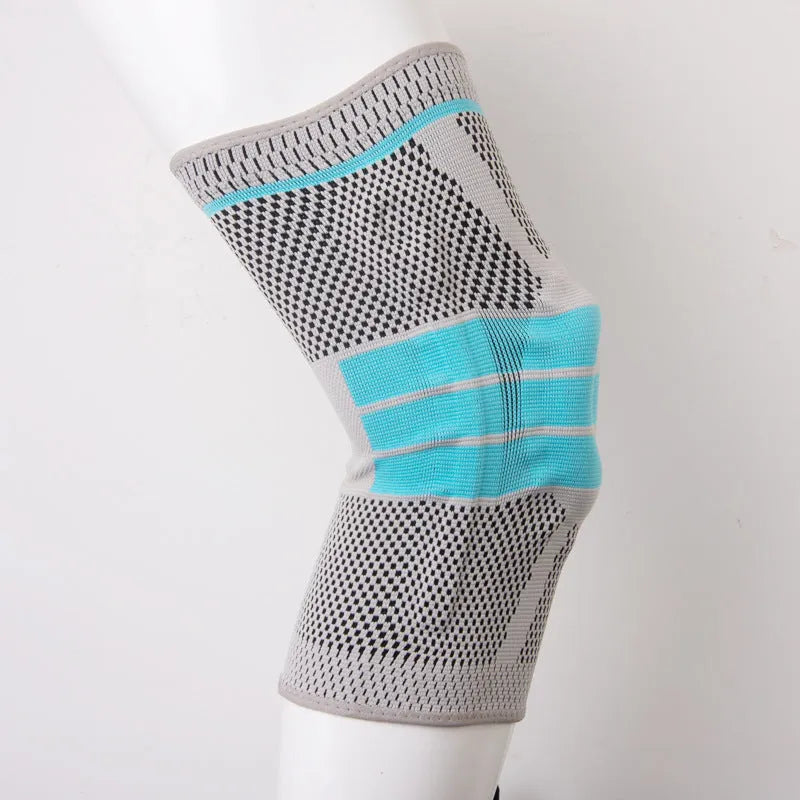 Sky blue silicone running basketball knee pad in elastic fibre material.