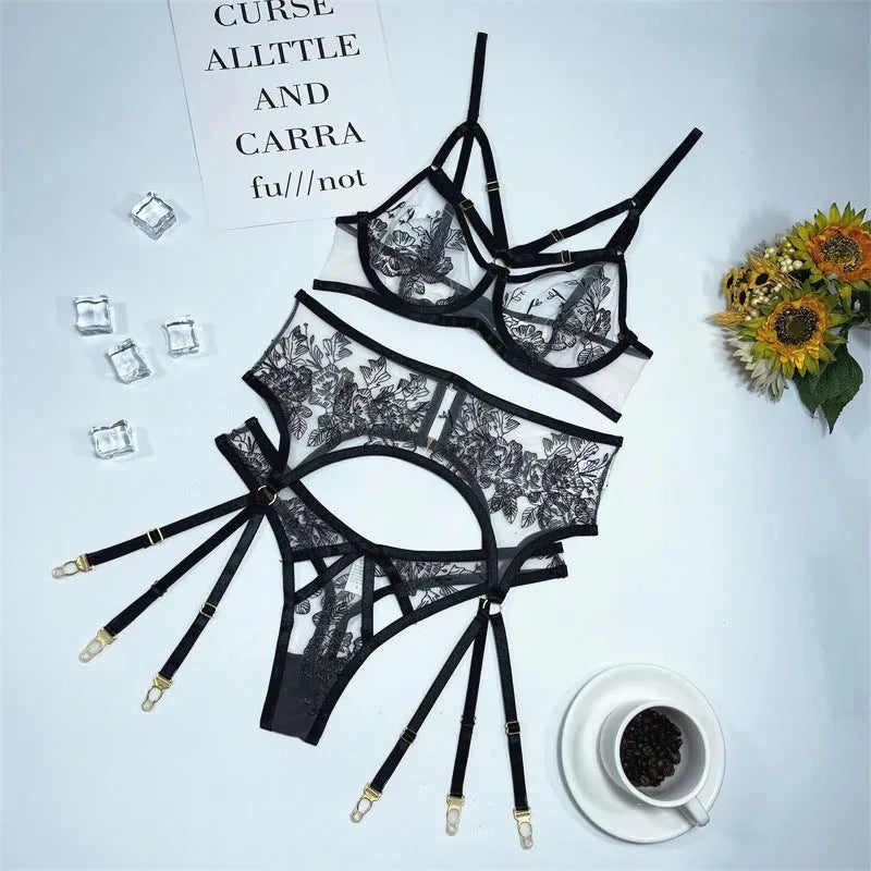 Women's black lace mesh three-piece set showing crop top, high-waist pants and waist ring with floral print