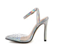 Women's pointed toe diamond sandals with stiletto heel and strappy PVC upper.