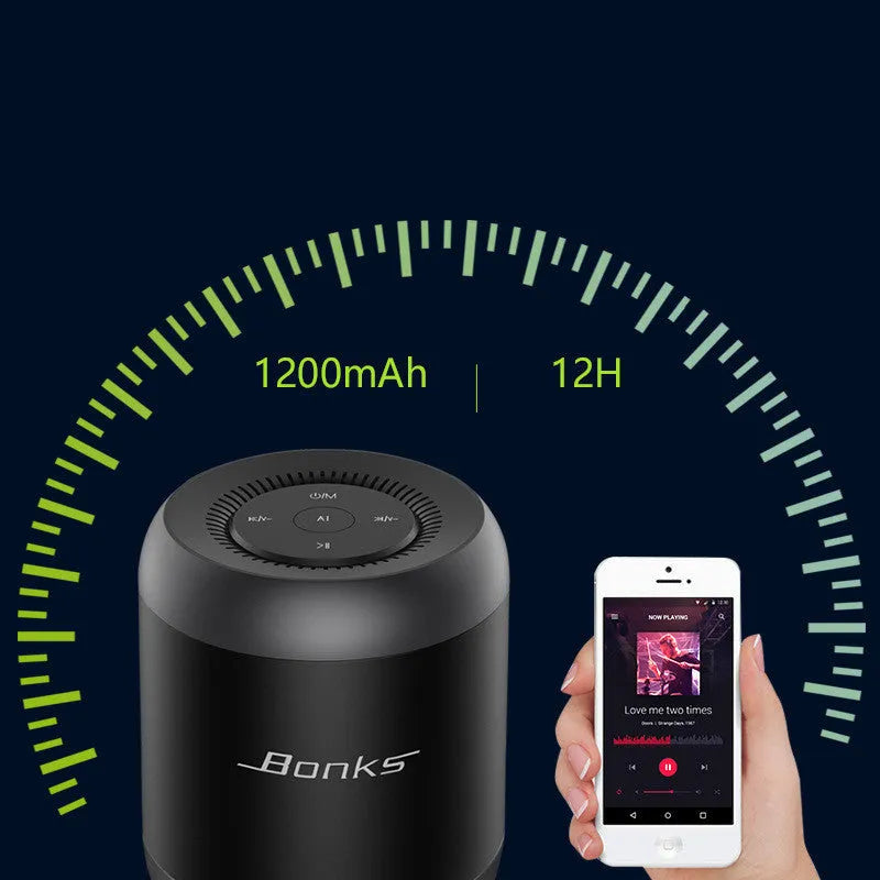 Black and white Bluetooth speaker with AI voice control features and circular plastic housing