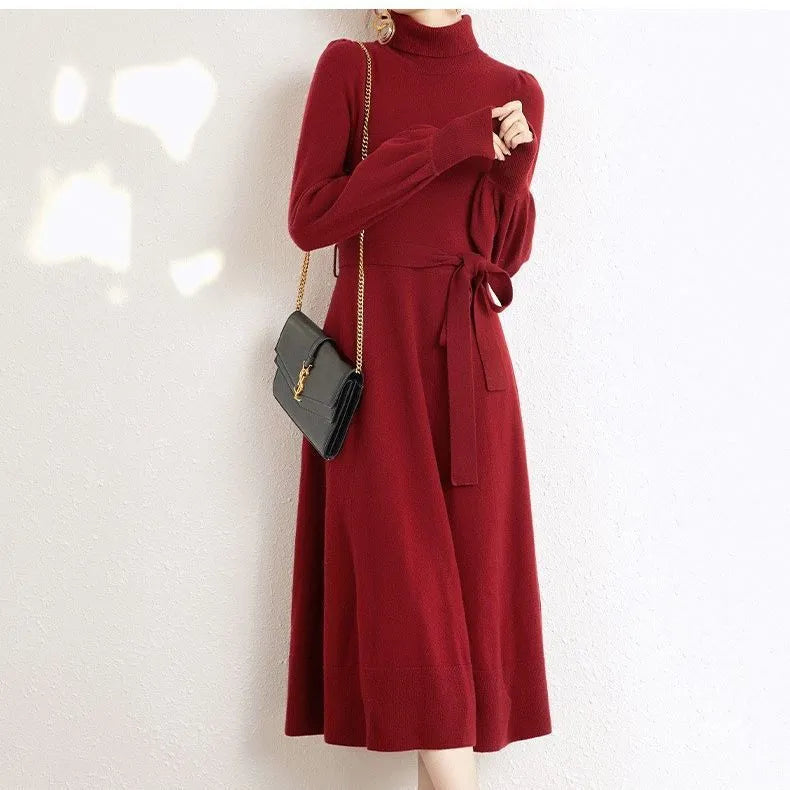 Turtleneck knitwear dress with elastic waist and loose big hem in polyester fabric