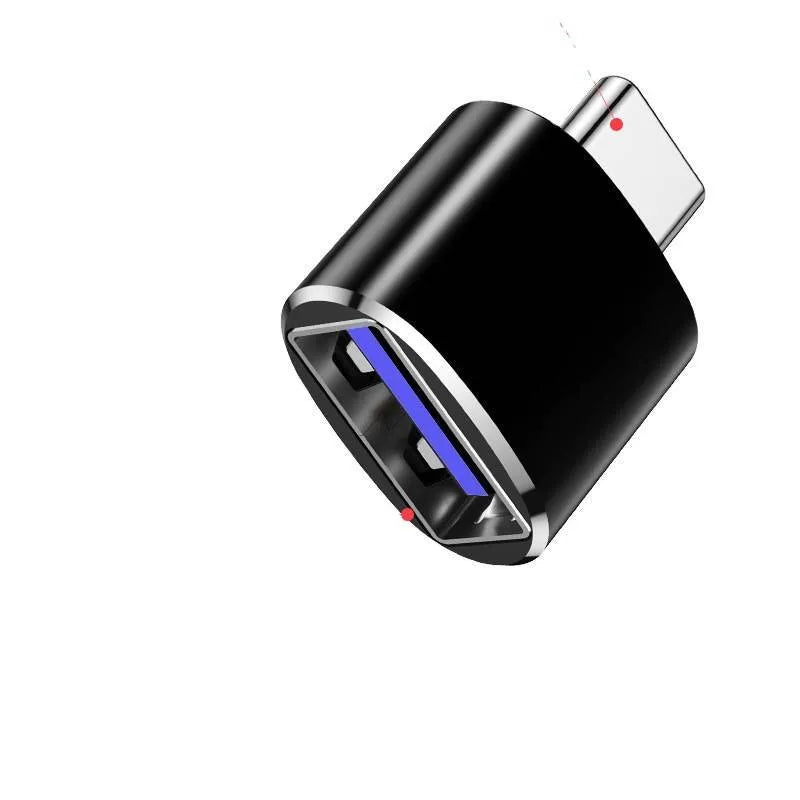 USB-C to dual USB-A OTG adapter in brushed aluminium, showing black, gold, and silver colour options.