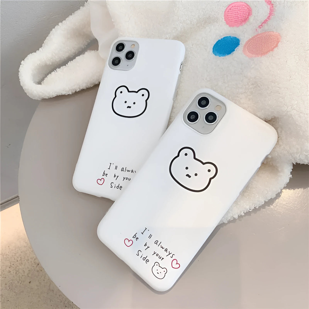 Soft silicone iPhone case with a Korean bear cartoon design on the back.