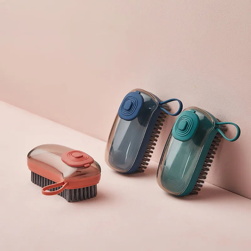 Blue automatic liquid cleaning brush with ergonomic grip on a white background.
