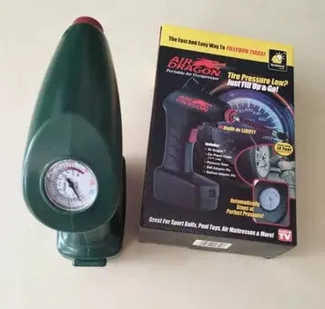 Black portable electric car air pump with motor and inflation hose for tyre pressure maintenance.