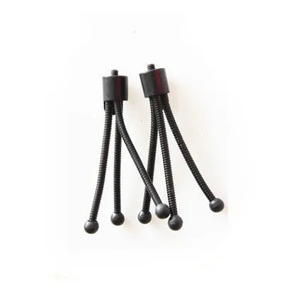 Small silver iron mini tripod with ball head, folded to compact size next to a smartphone.