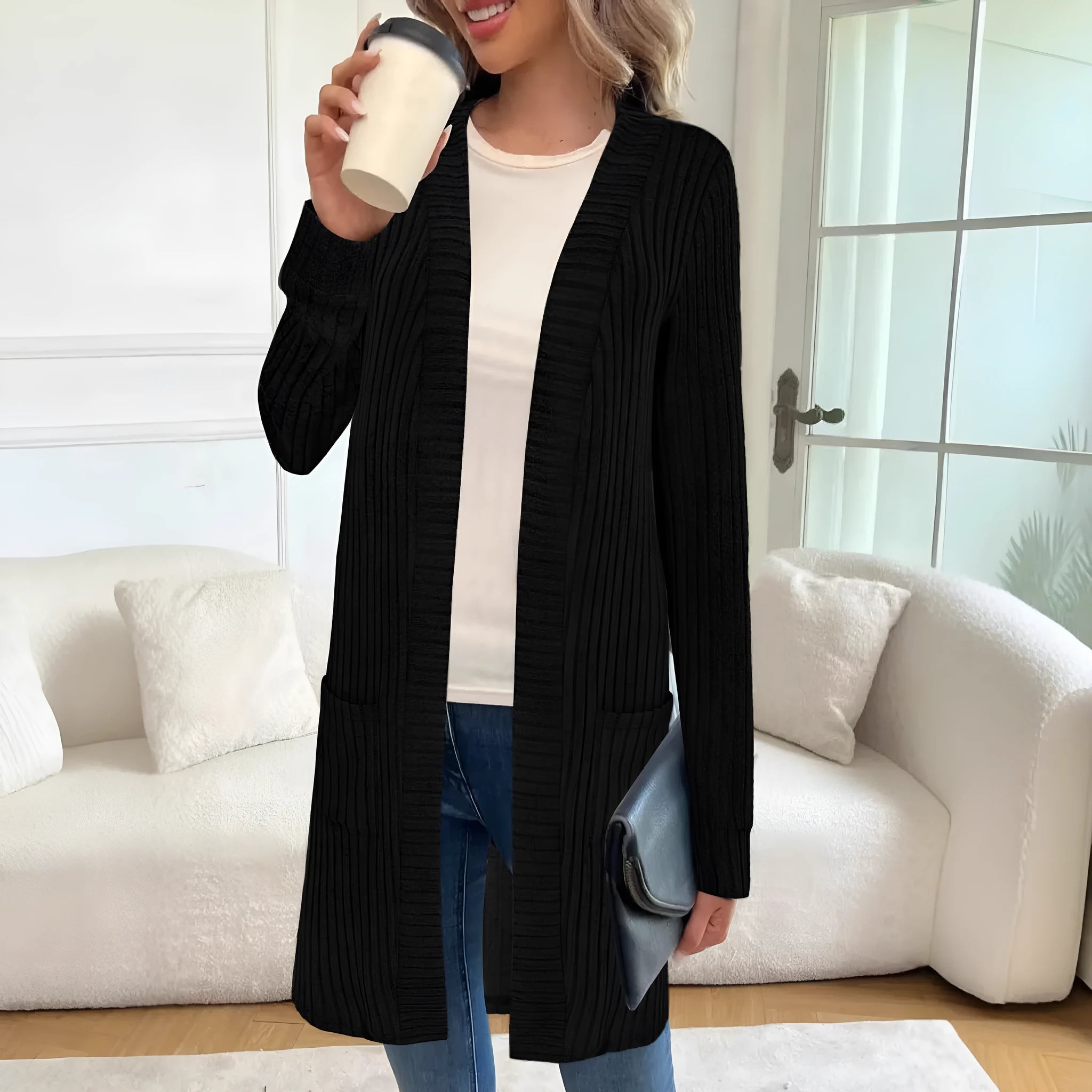 Long sleeve knitted cardigan jacket in black colour with loose pockets and regular sleeves