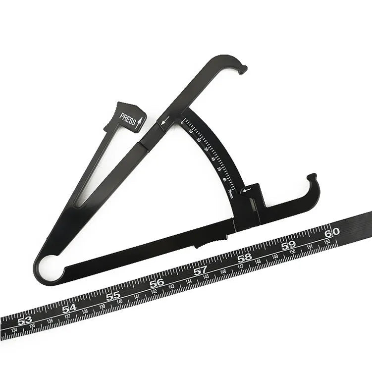 Black ABS plastic body fat caliper skinfold measuring instrument on a tape measure