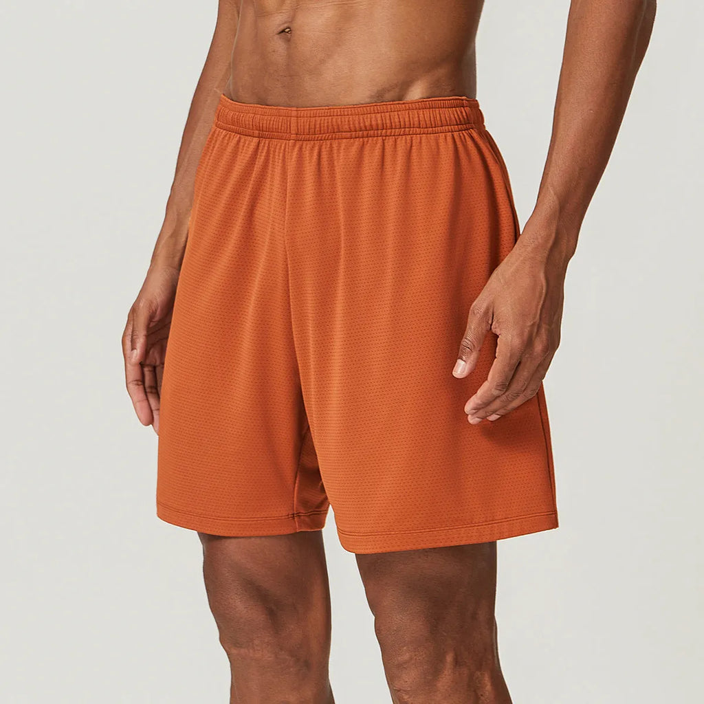 Men's quick-dry running shorts in brick red colour showing double-layer construction