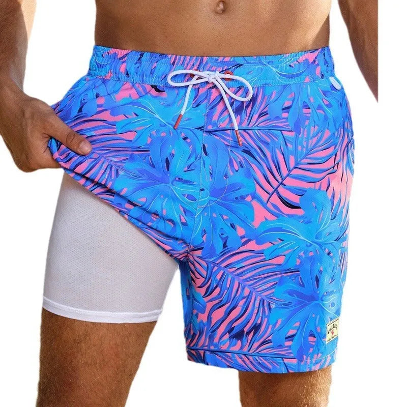 Men's loose quick-drying swimming trunks in floral pattern with boxer-style cut