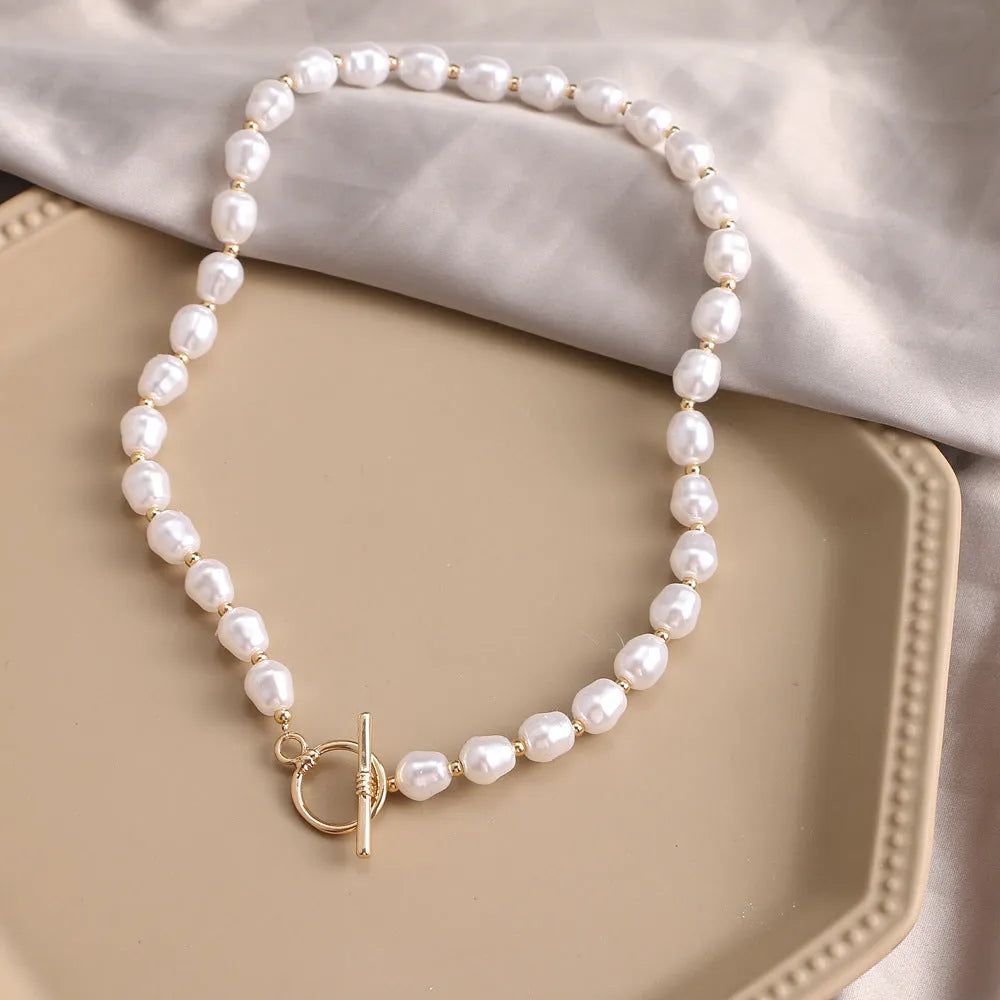 Vintage gold electroplated heart pendant necklace with adjustable pearl chain