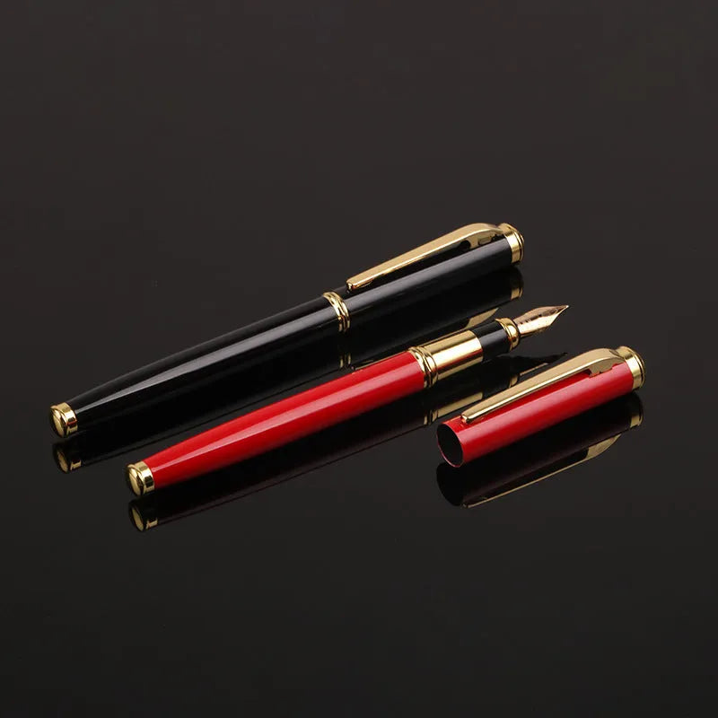 Red and black metal fountain pen with a 0.5mm Yijin nib on a writing surface.