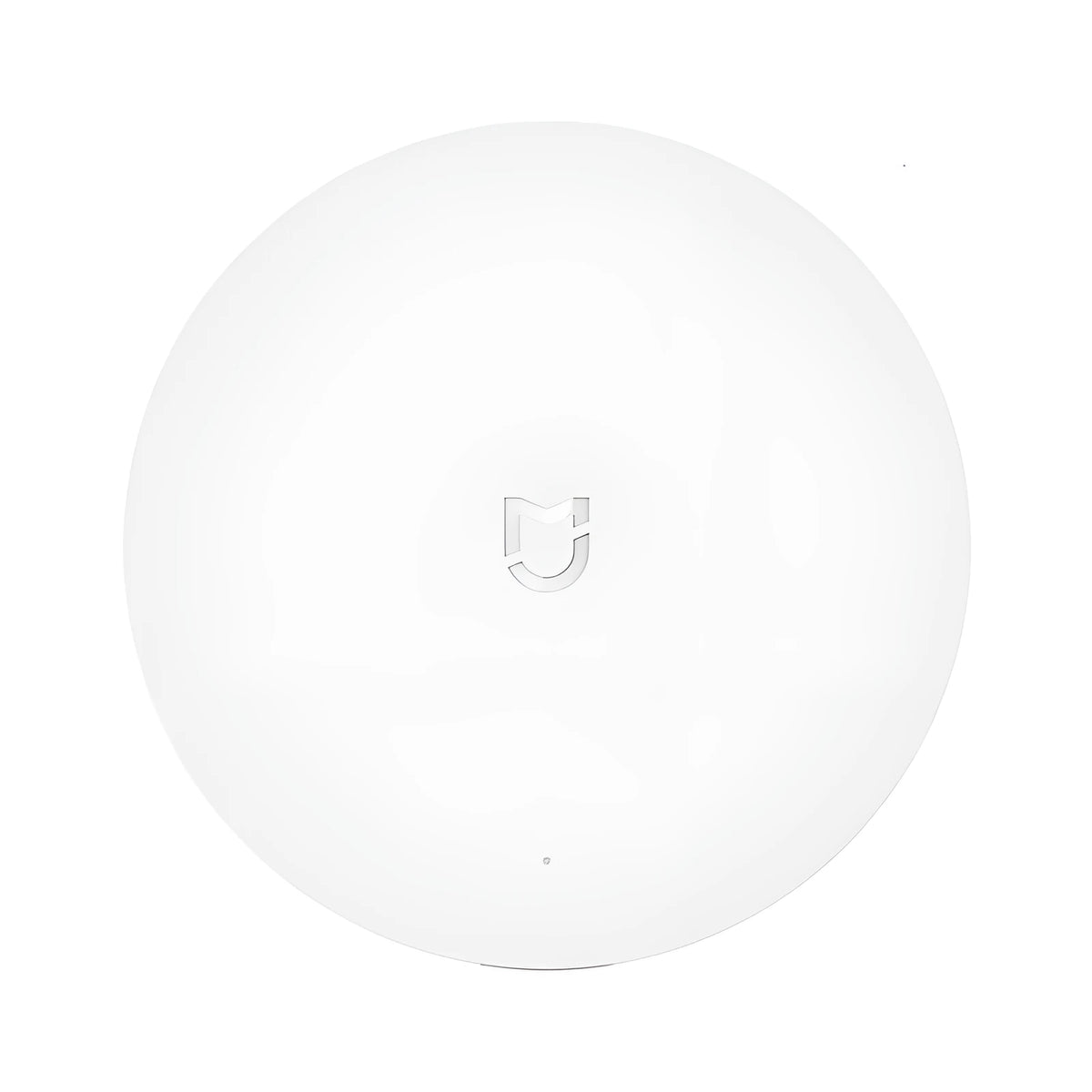 White circular Xiaomijia smart home gateway with UK plug, 90mm diameter wireless wall switch