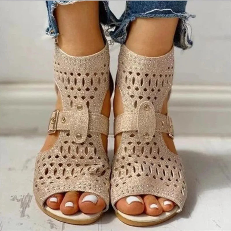 Women's beige sandals with wedge heel and back zipper closure showing fish mouth toe shape