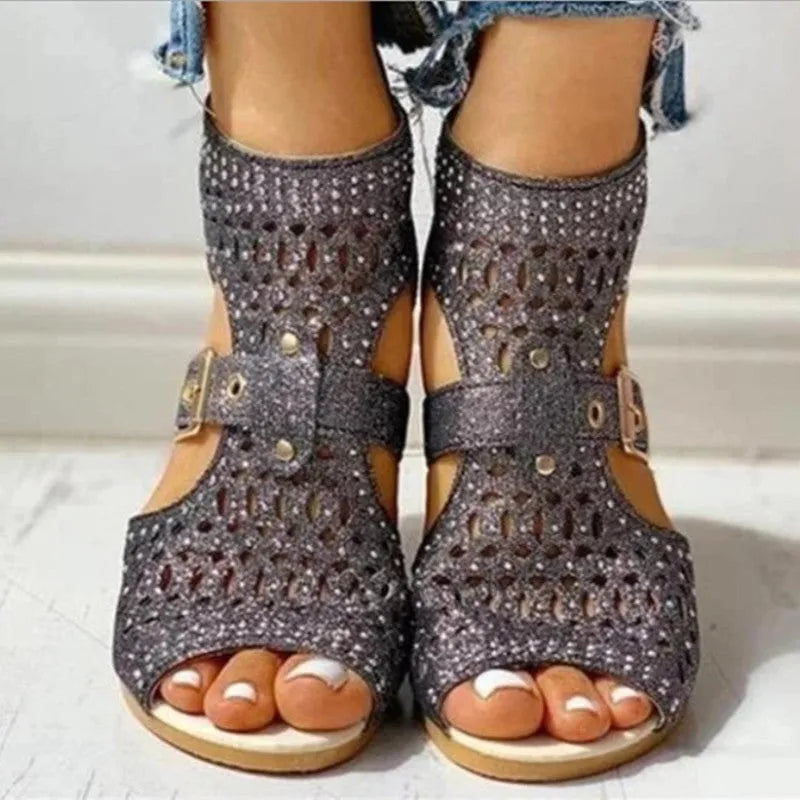 Women's beige sandals with wedge heel and back zipper closure showing fish mouth toe shape