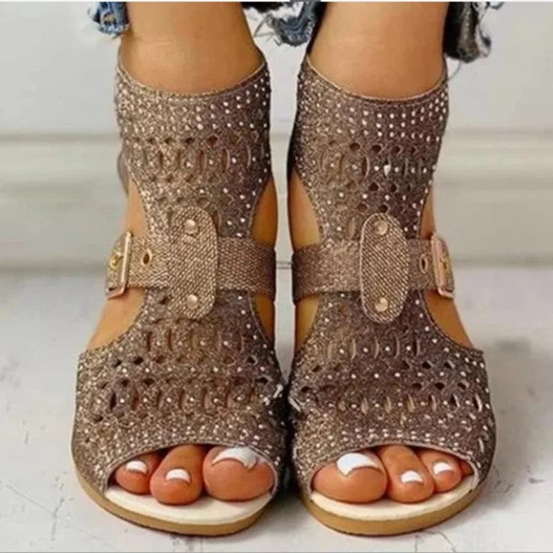 Women's beige sandals with wedge heel and back zipper closure showing fish mouth toe shape