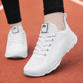 Women's high-top casual trainers with tide shoe net top design and back-lacing closure in black, pink, or white colours