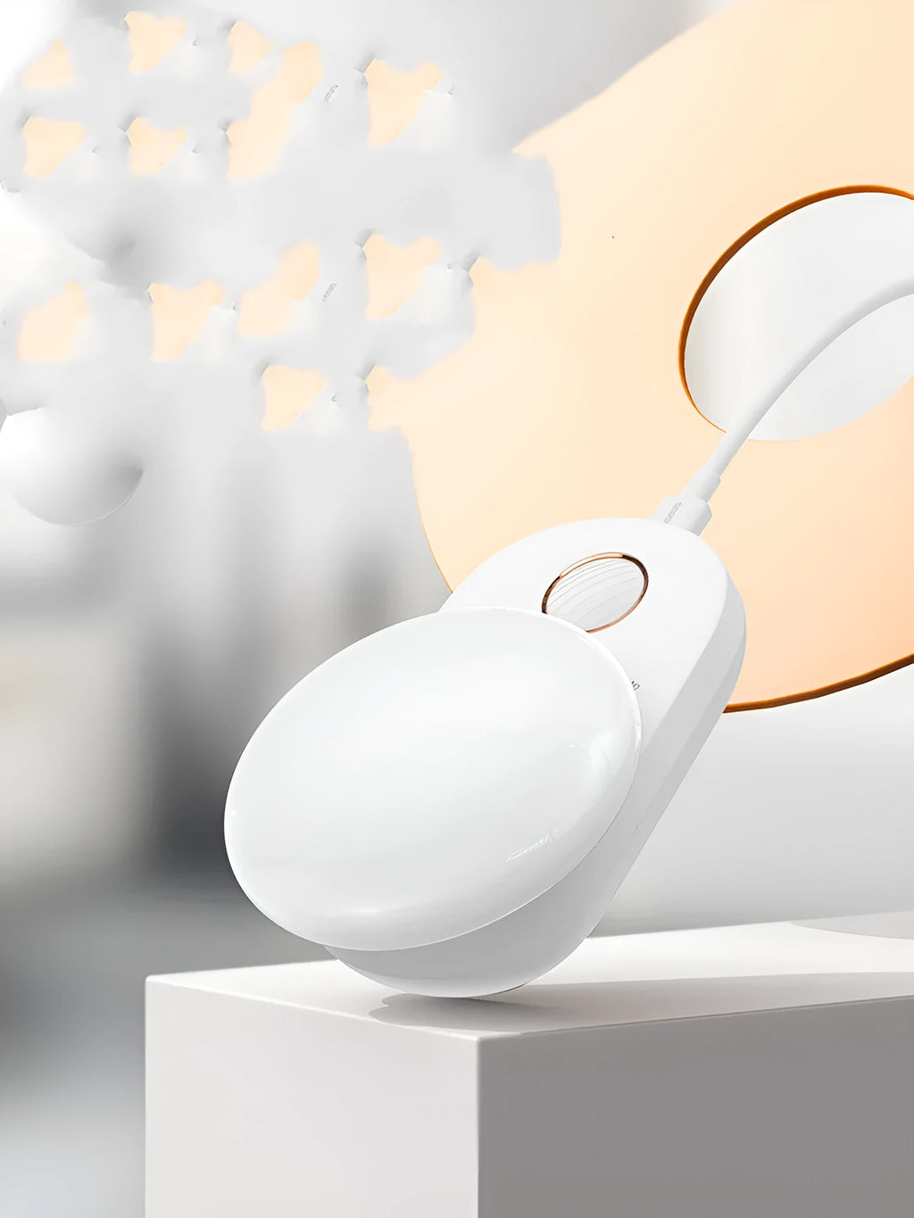 White Baseus rechargeable night light with motion sensor on a bedside table.