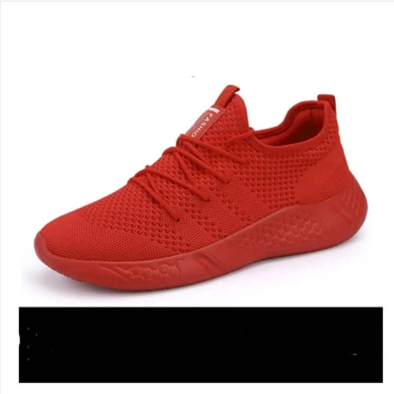Men's black and white casual sneakers with mesh upper and lace-up closure for jogging.